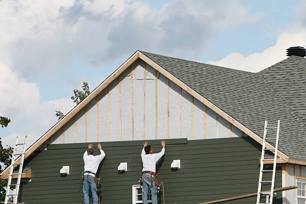 Professional Storm Damage Siding Repair technician working in Summerfield, MD